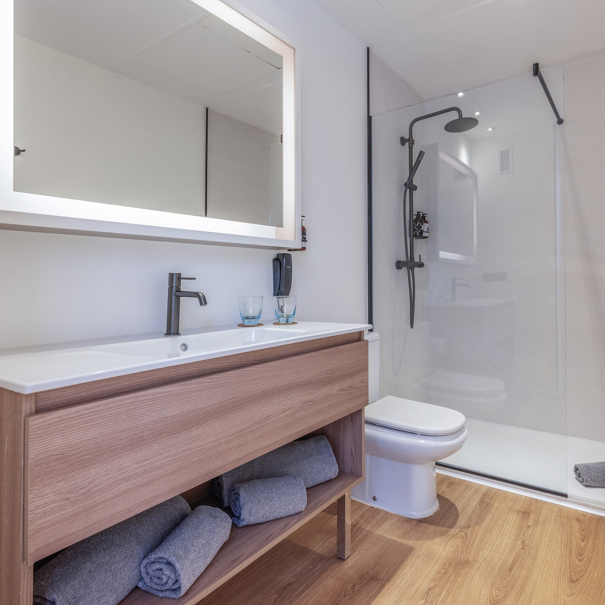 a bathroom with a mirror and a sink