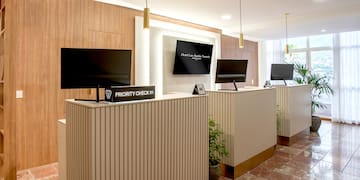 a reception desks with computers