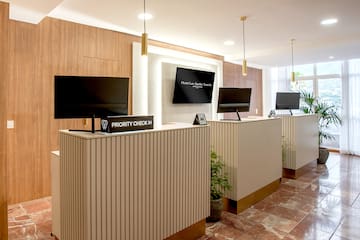 a reception desks with computers