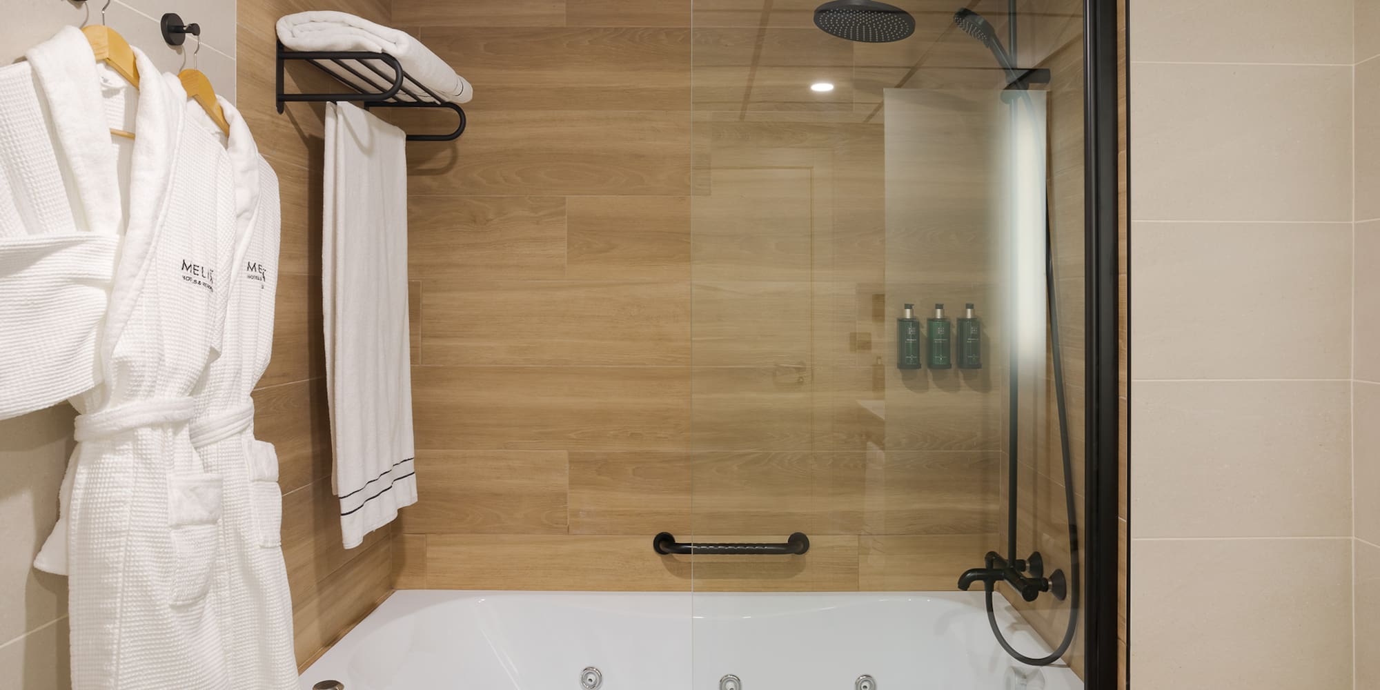 a bathtub and shower in a bathroom