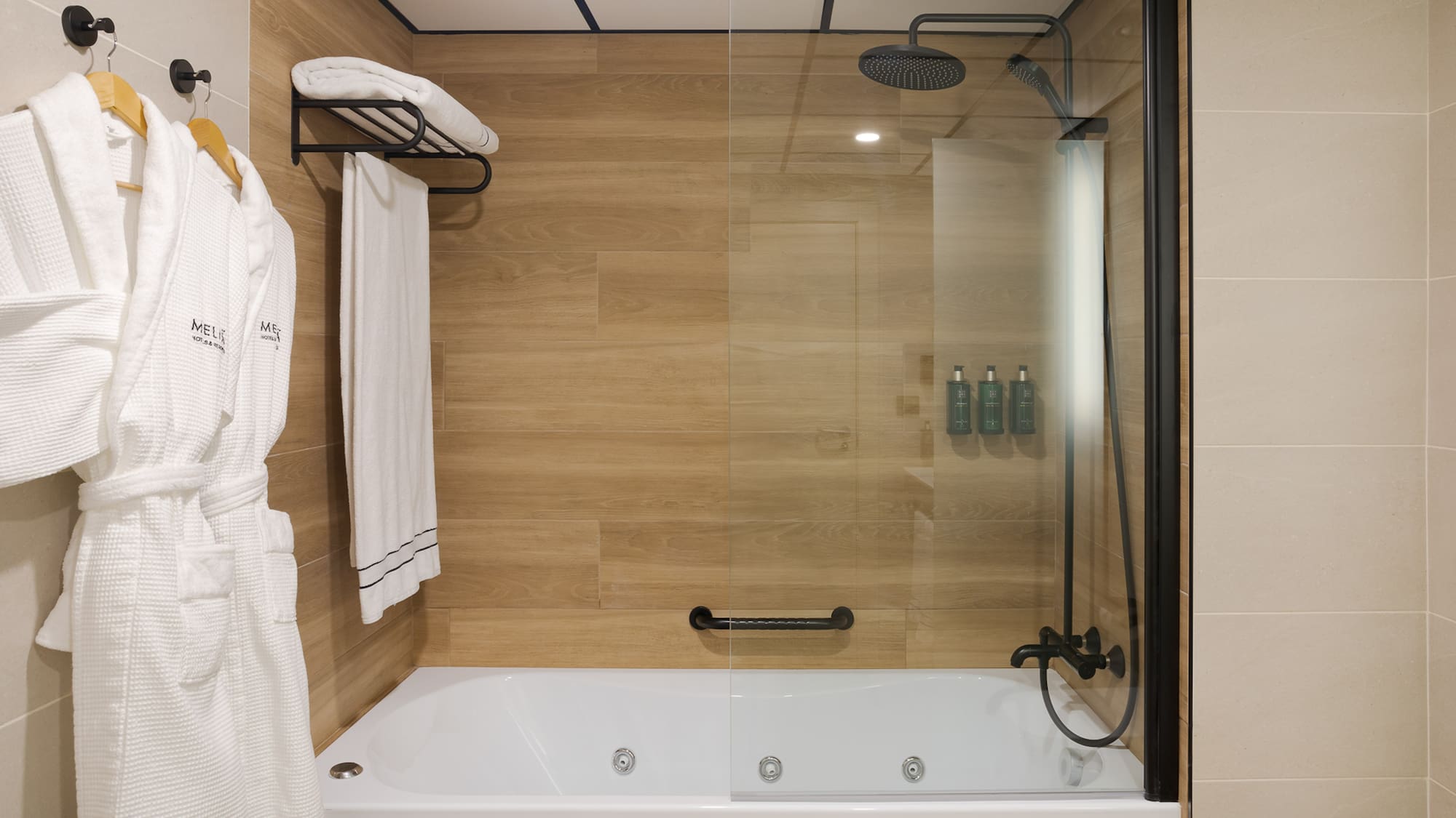 a bathtub and shower in a bathroom