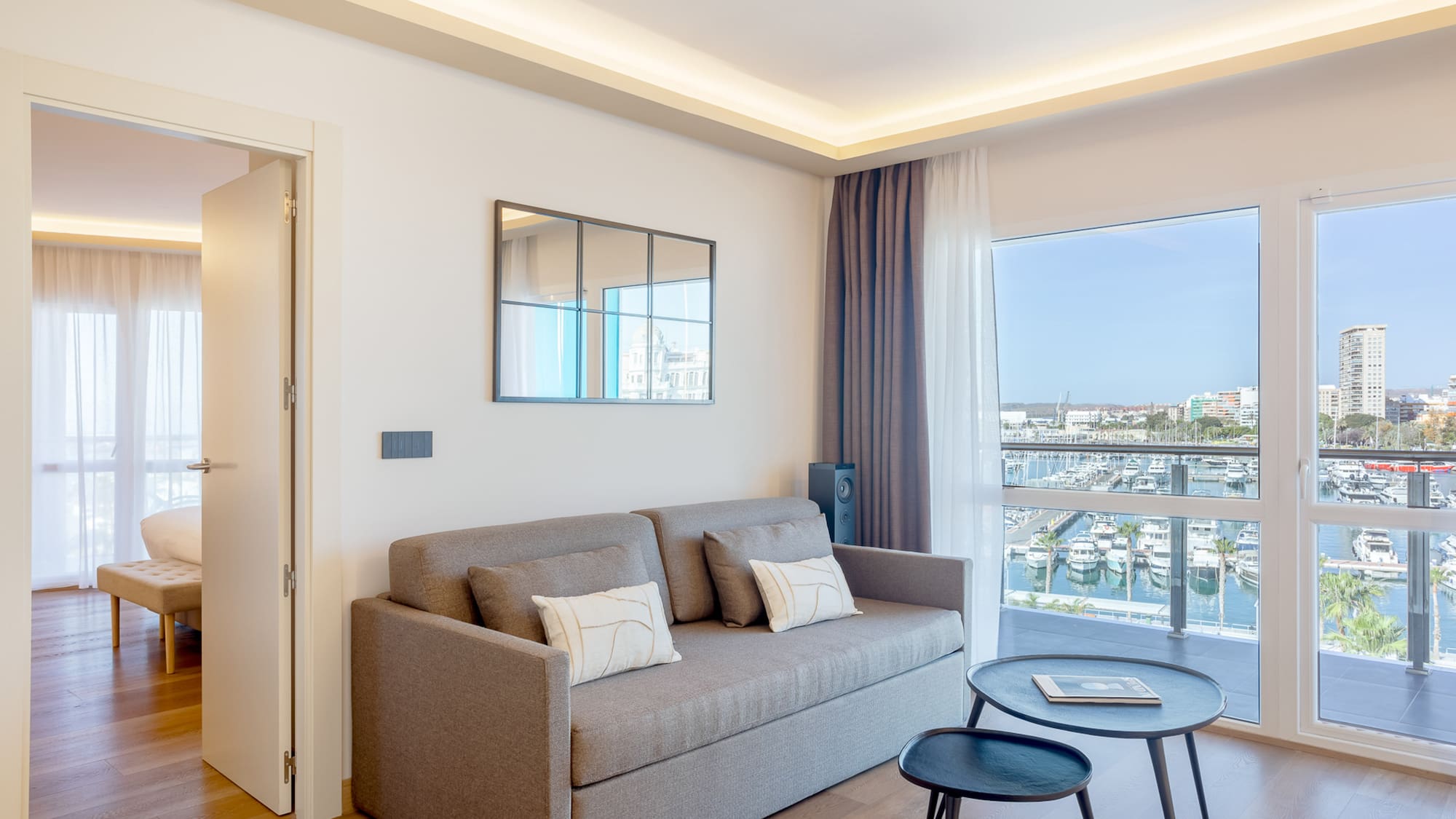 a living room with a couch and a table