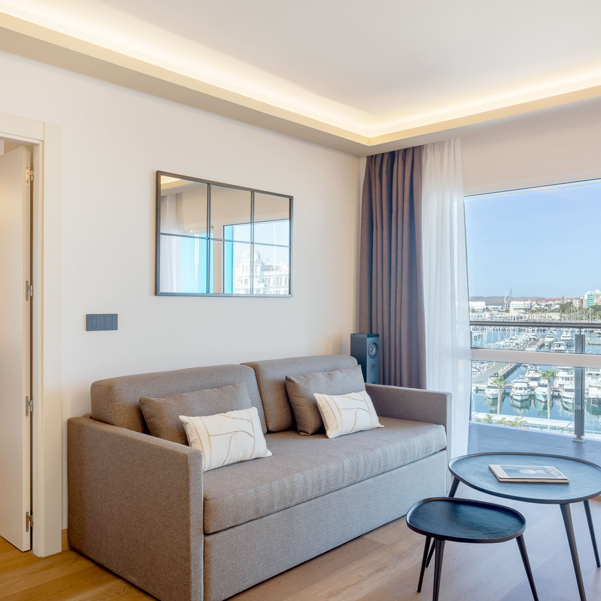 a living room with a couch and a table