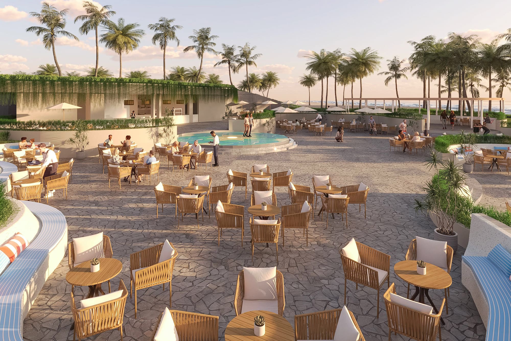 a group of people sitting at tables and chairs outside