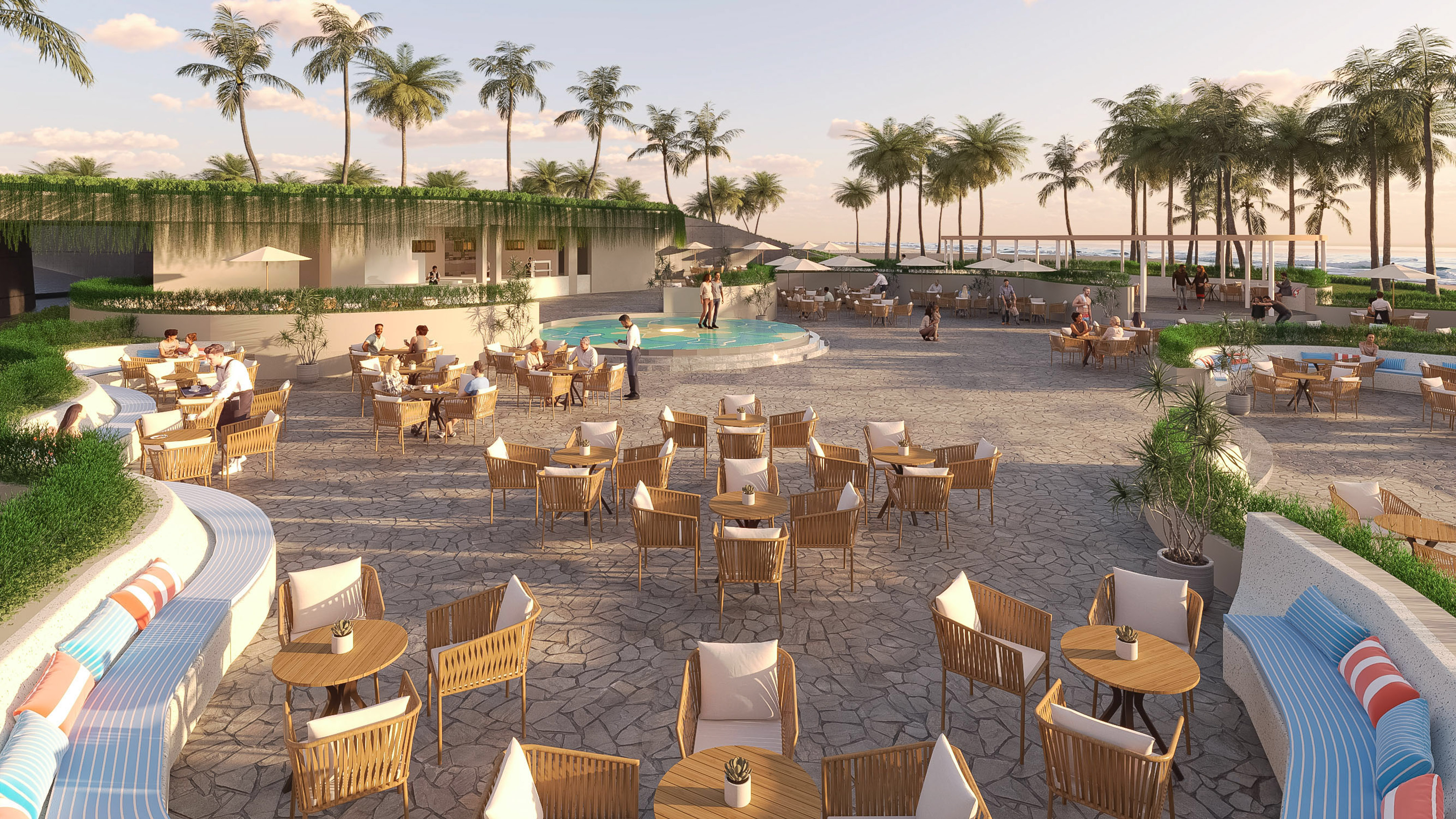 Tropical resort outdoor dining patio with guests, palm trees, and ocean view.
