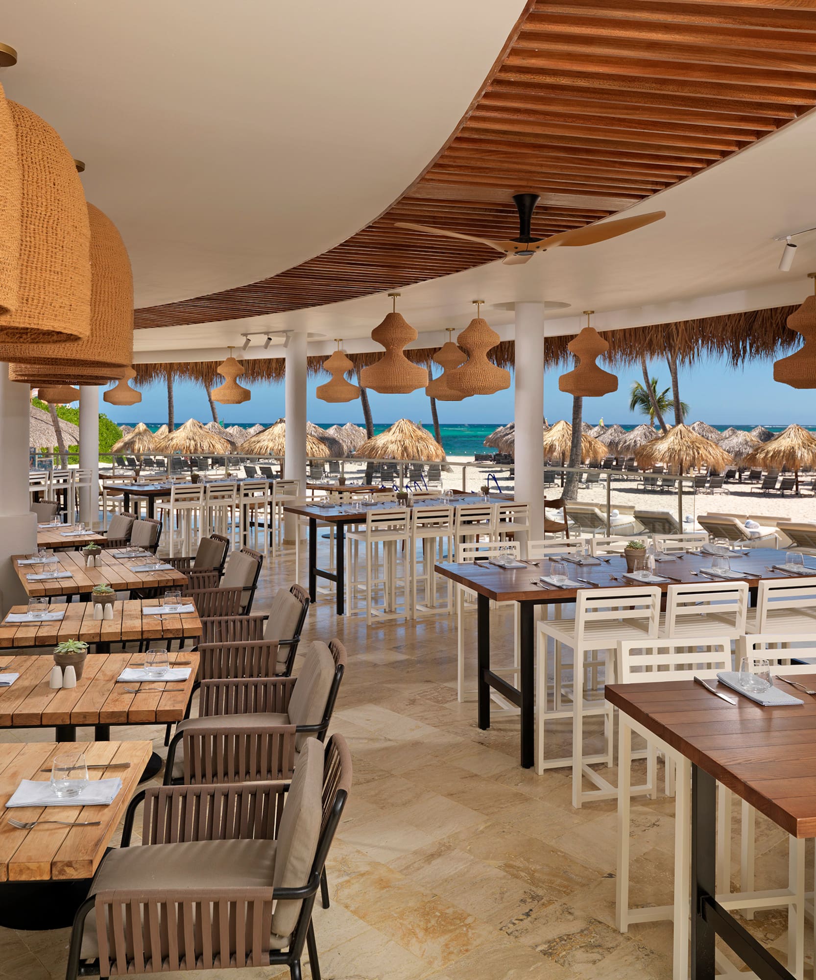 a restaurant with tables and chairs