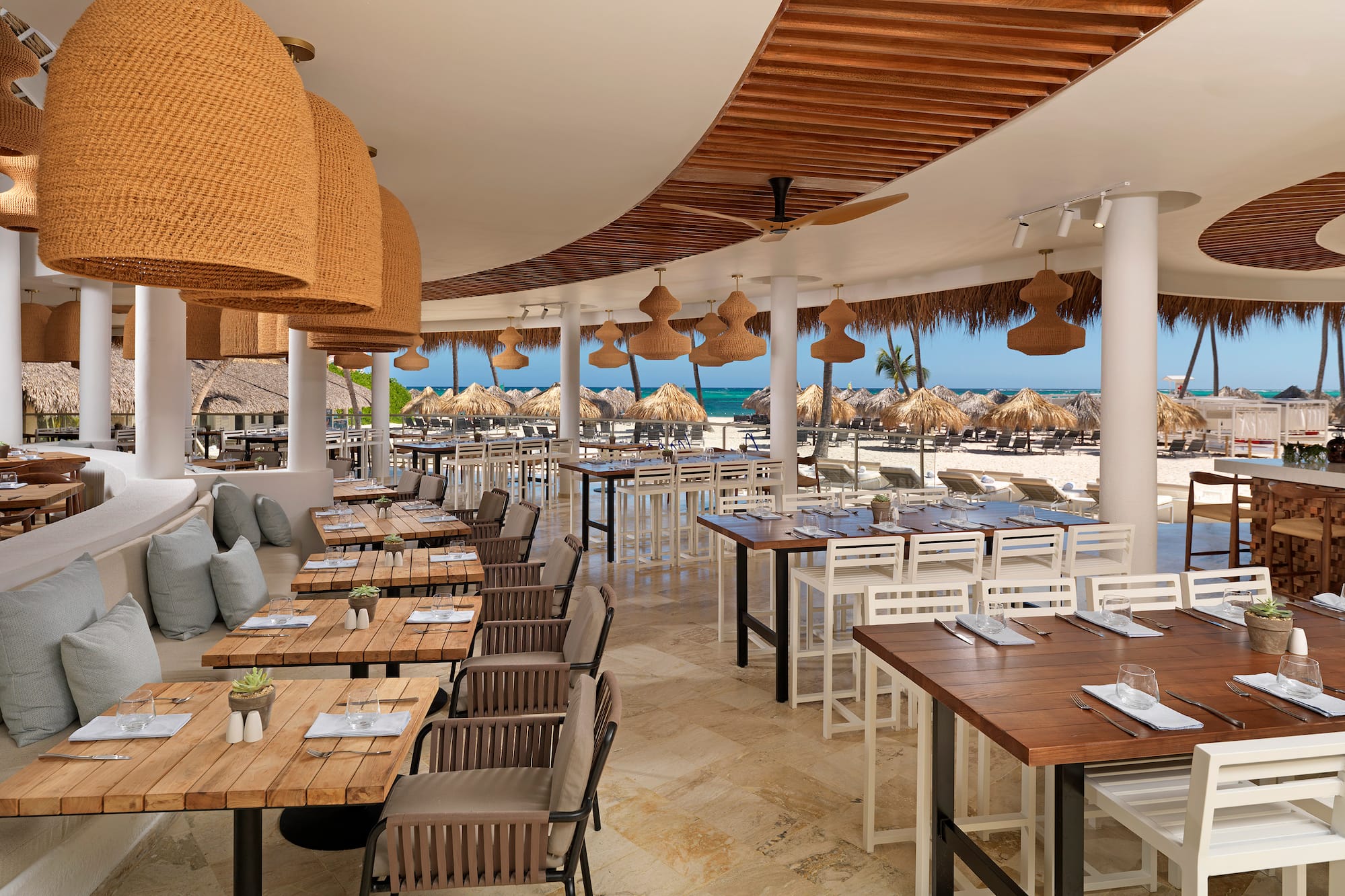 a restaurant with tables and chairs
