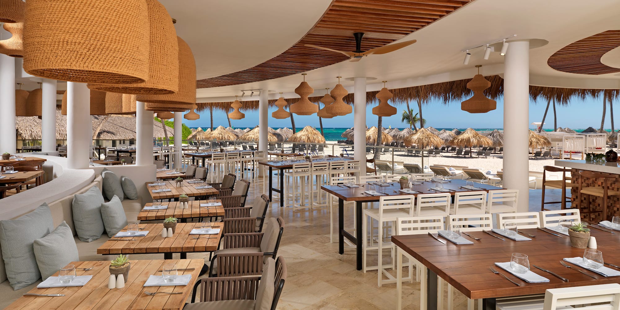 a restaurant with tables and chairs