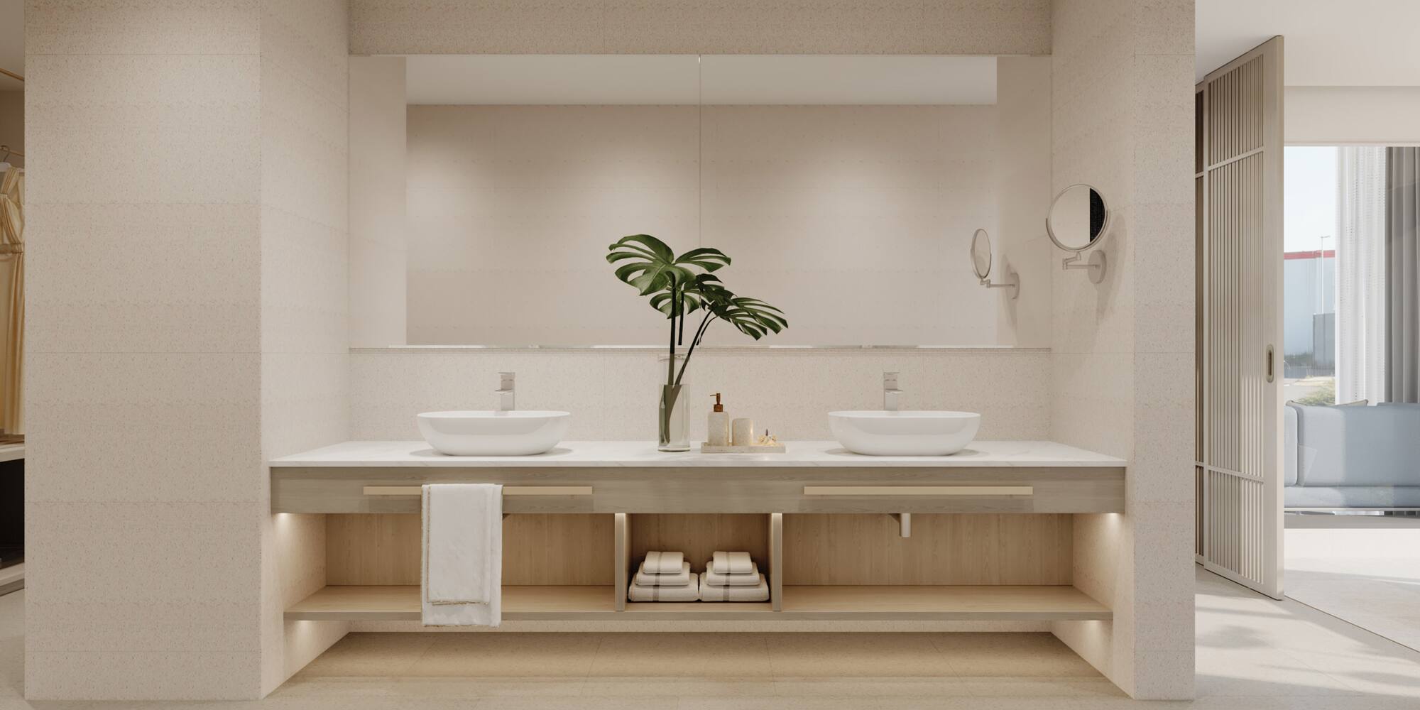 a bathroom with a plant on the counter