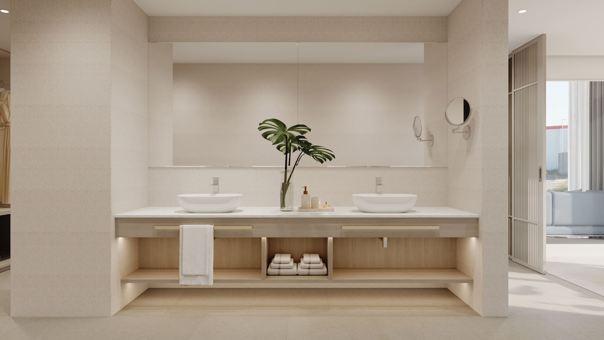 a bathroom with a plant on the counter