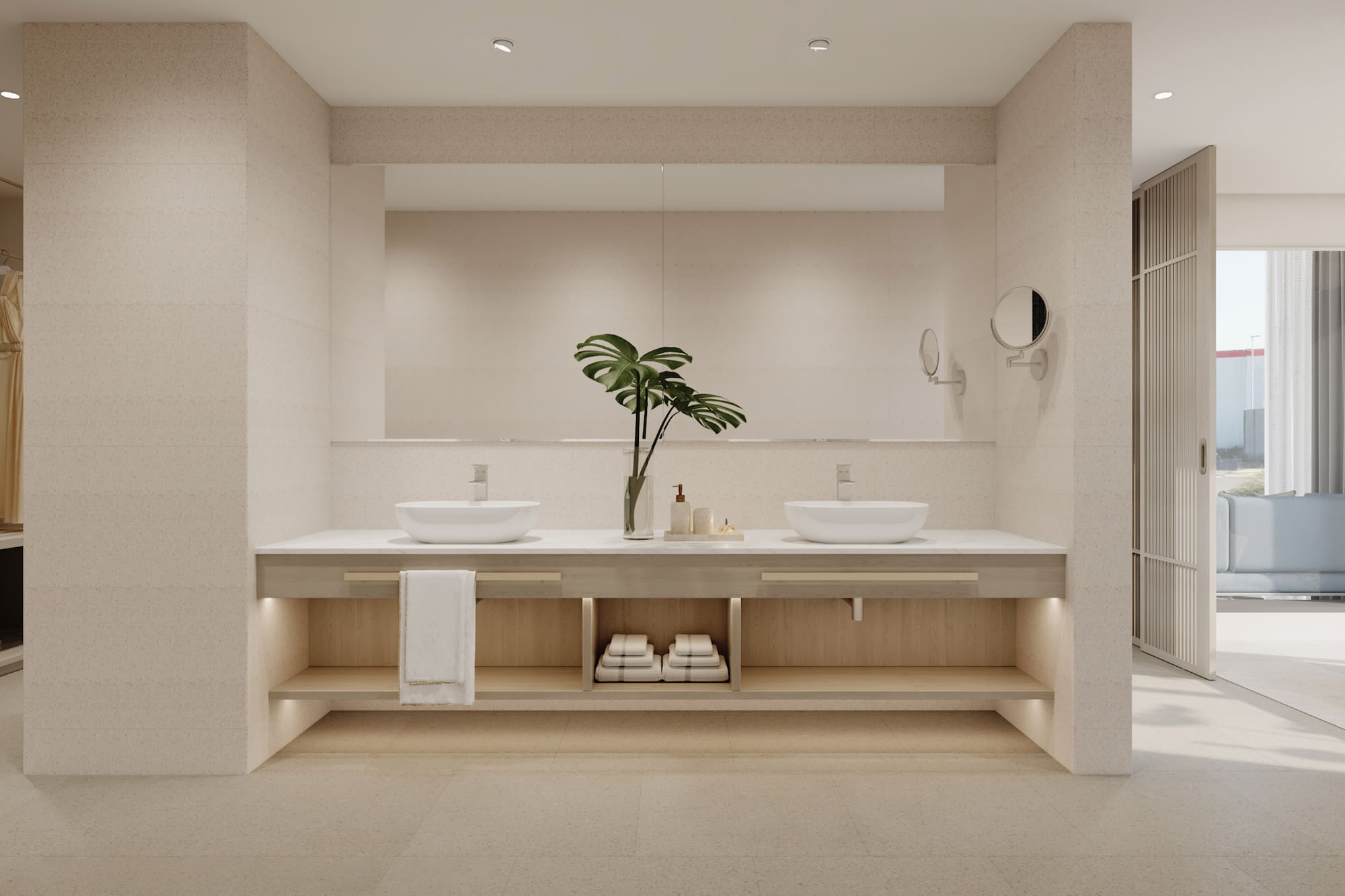 a bathroom with a plant on the counter