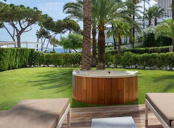 a hot tub in a backyard