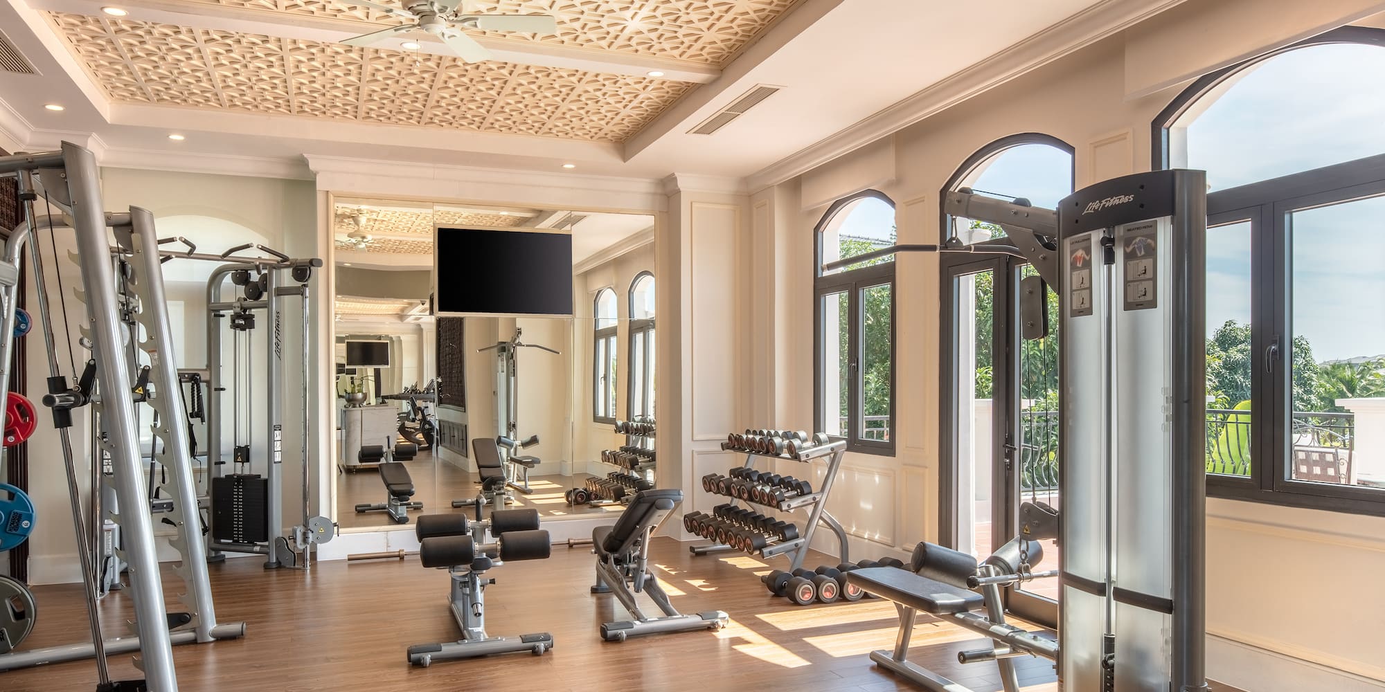 a large room with exercise equipment