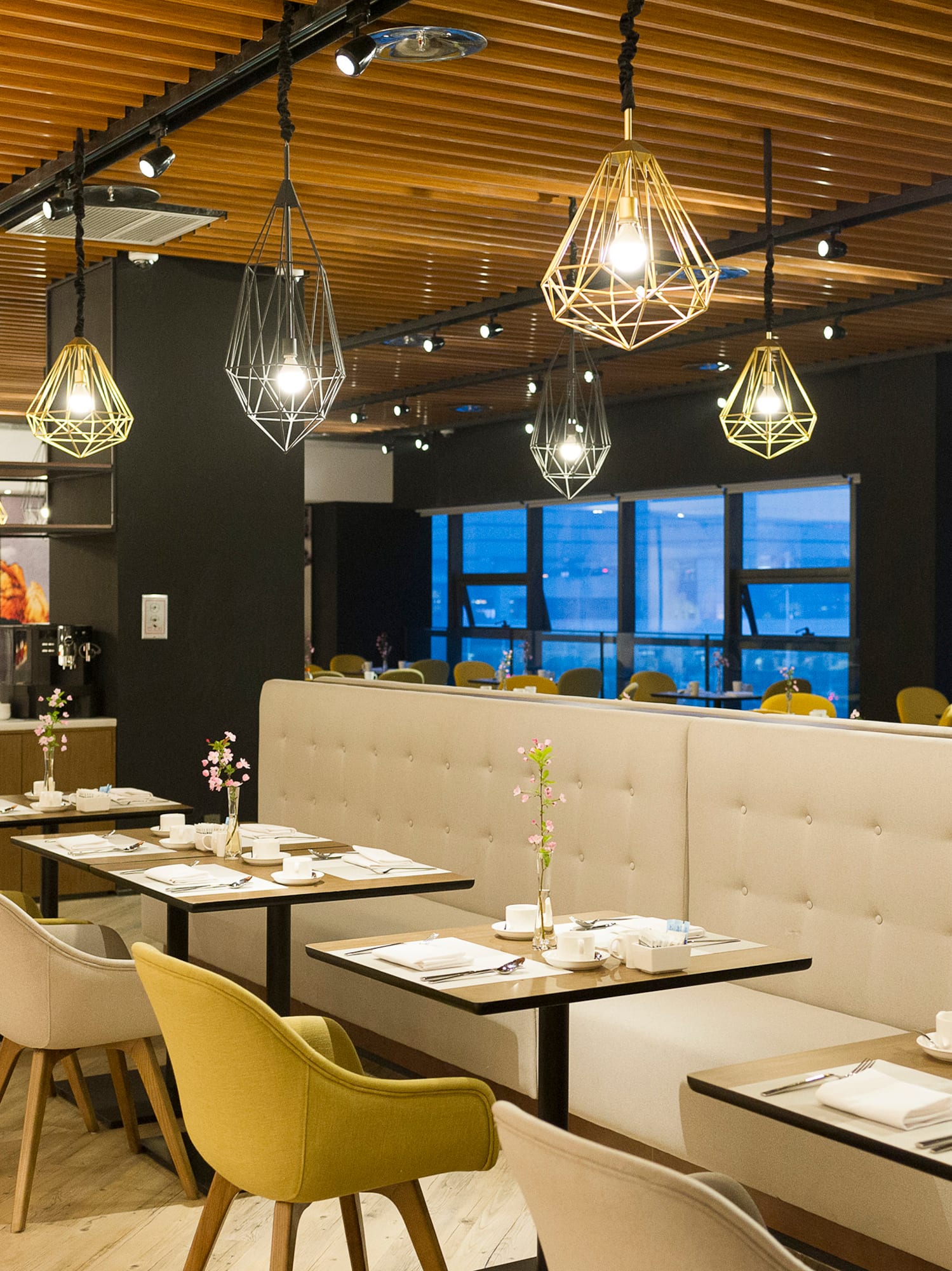 a restaurant with tables and chairs