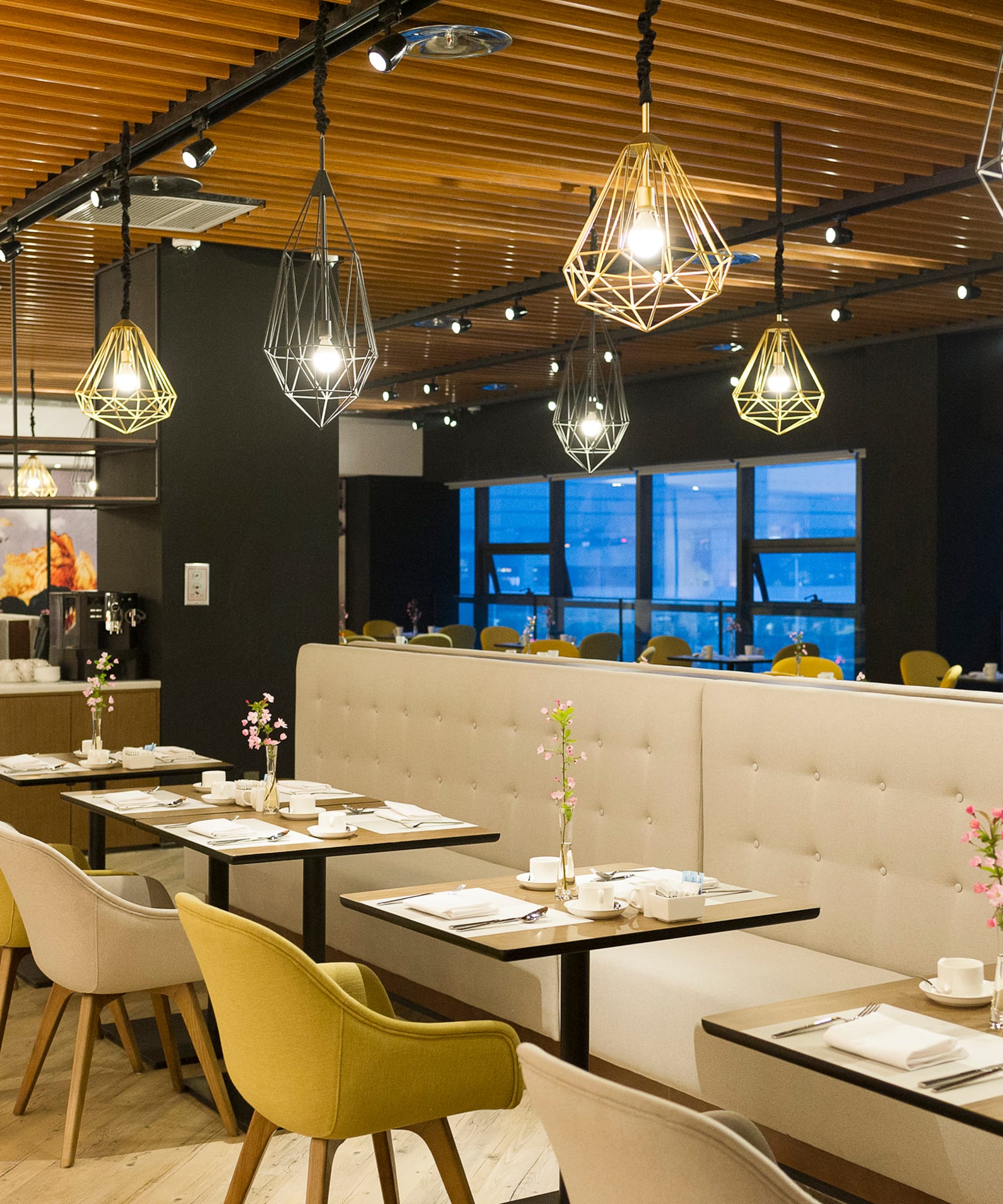 a restaurant with tables and chairs