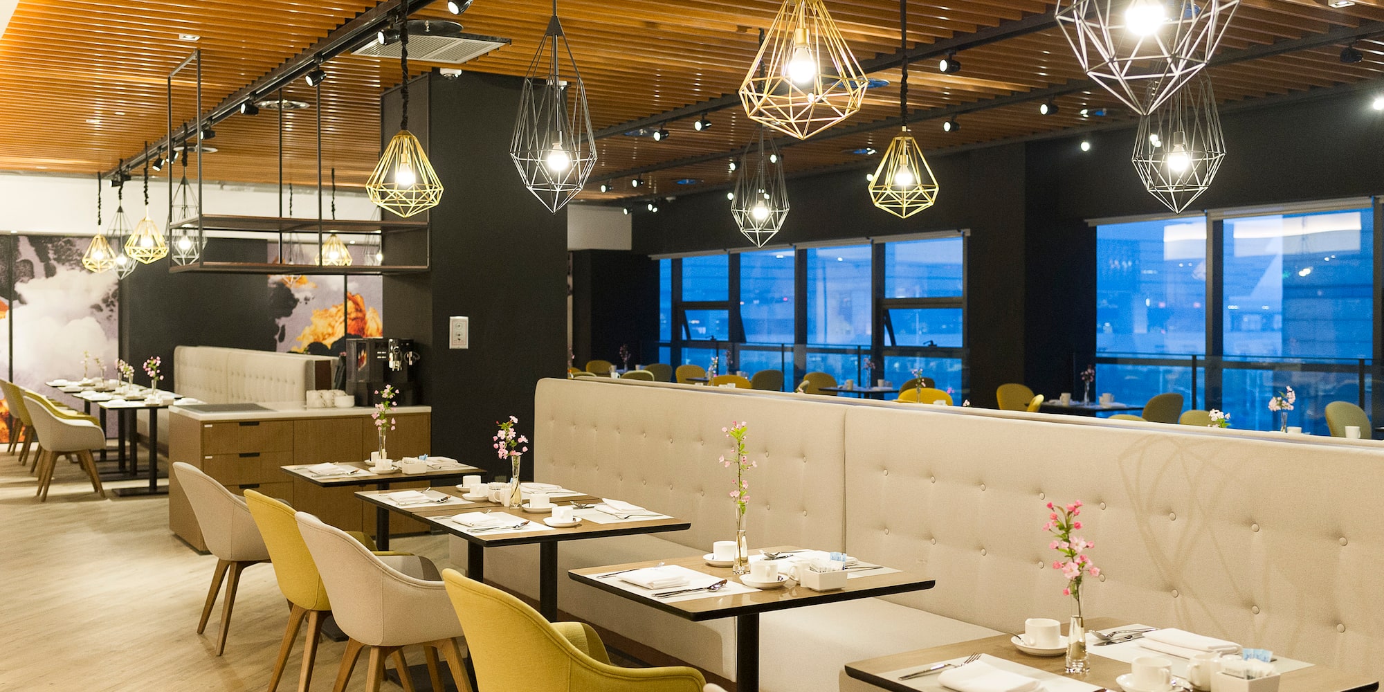 a restaurant with tables and chairs