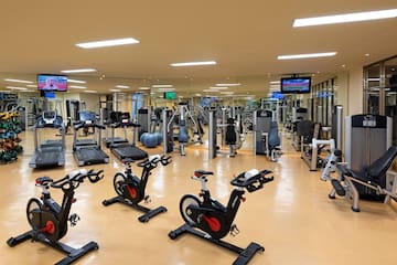 a large room with exercise equipment