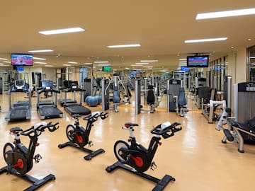 a large room with exercise equipment