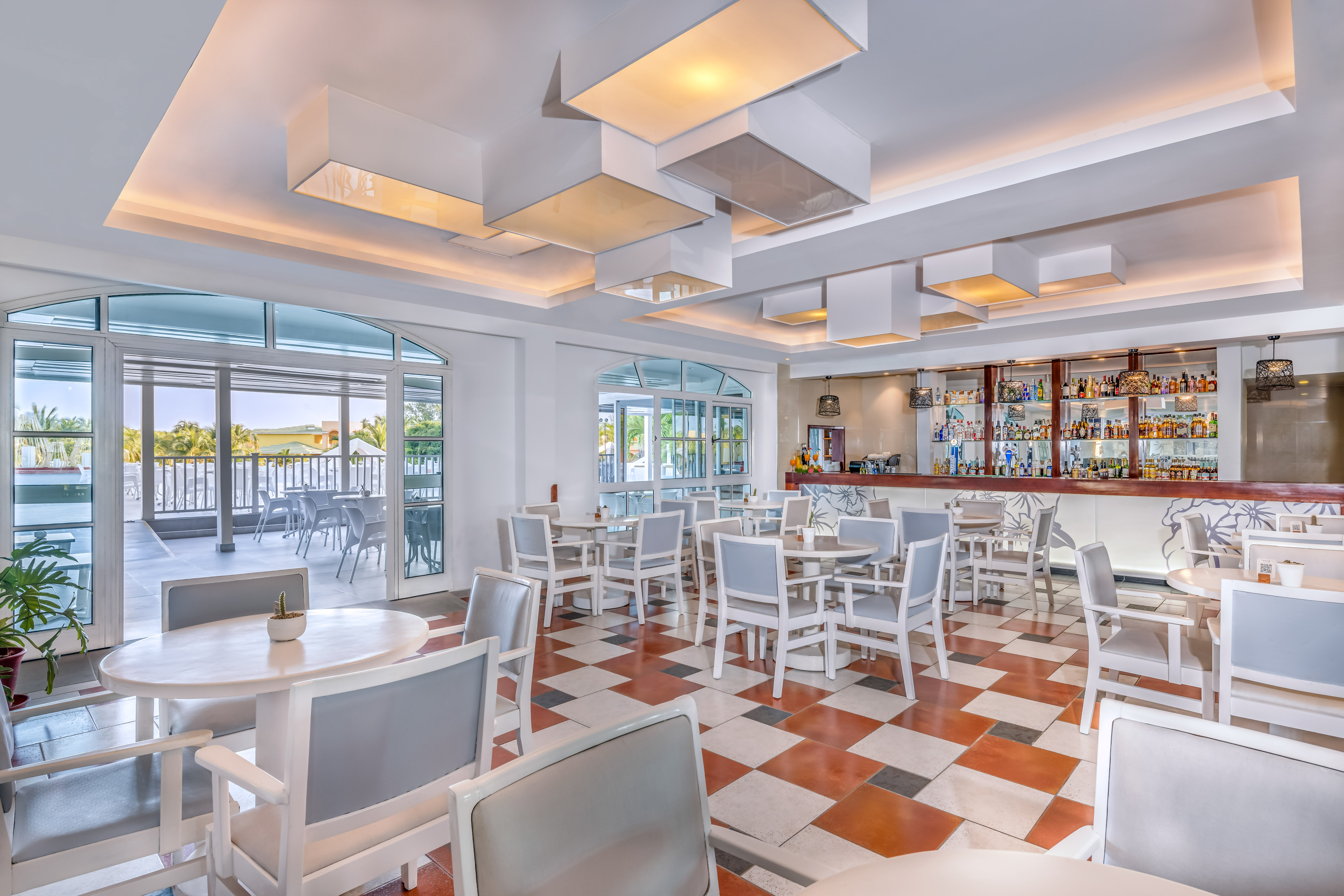 a room with tables and chairs