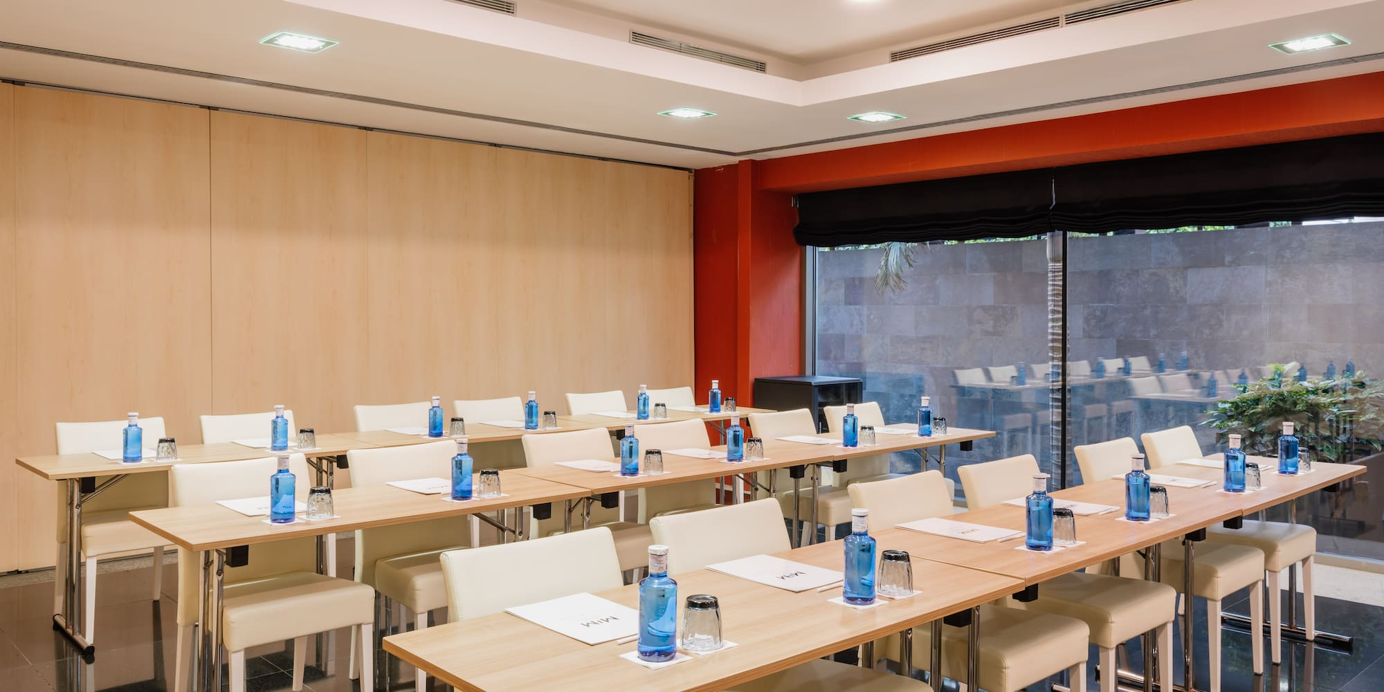 a room with tables and chairs