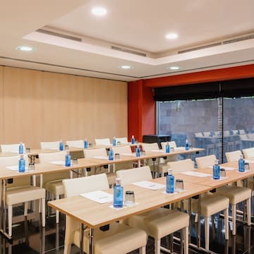 a room with tables and chairs