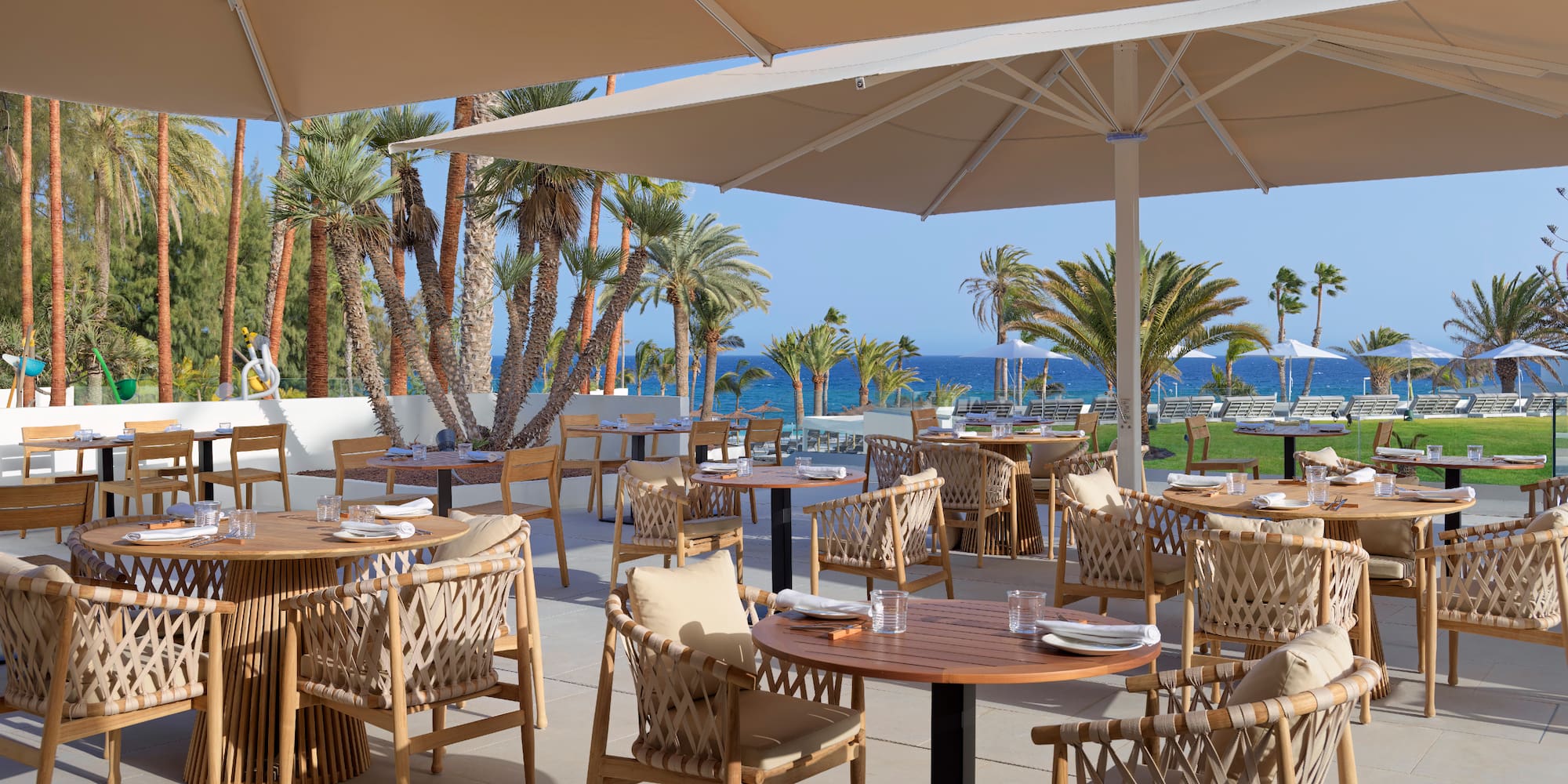 a restaurant with tables and chairs