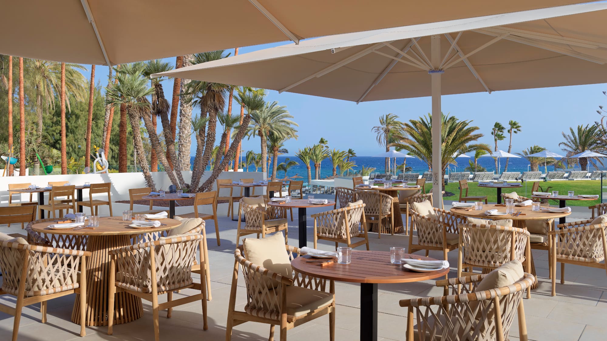 a restaurant with tables and chairs