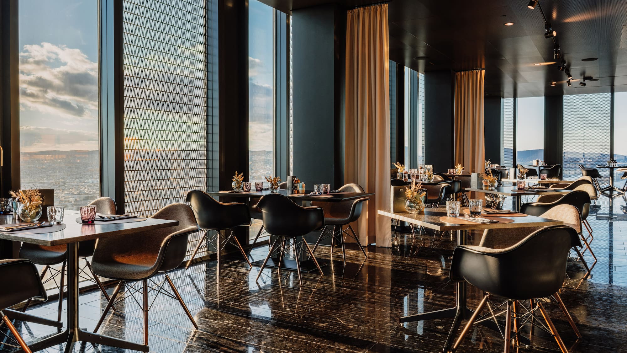 a room with tables and chairs