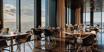 a room with tables and chairs