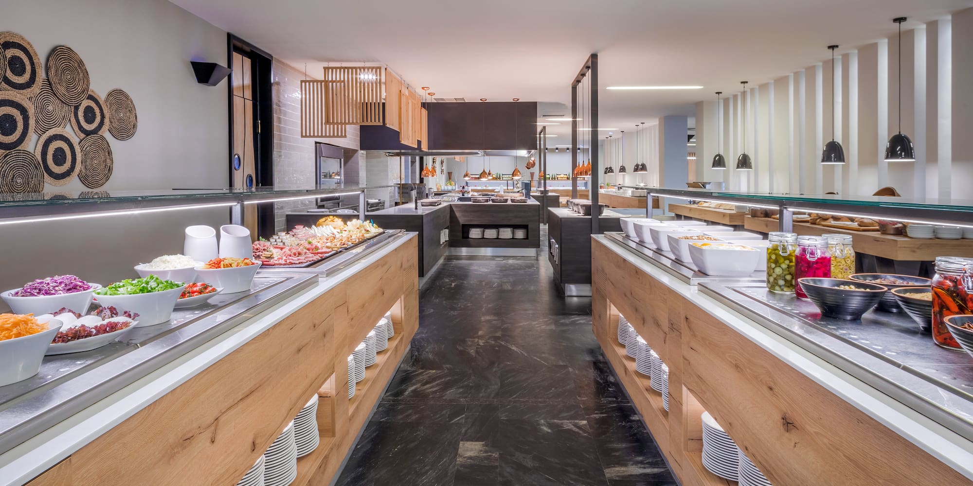 a large kitchen with food on the counter