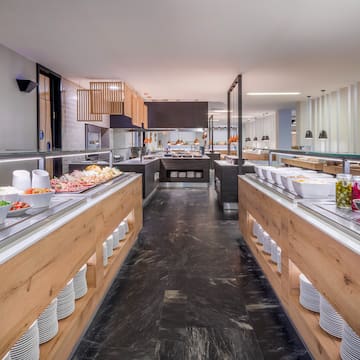 a large kitchen with food on the counter