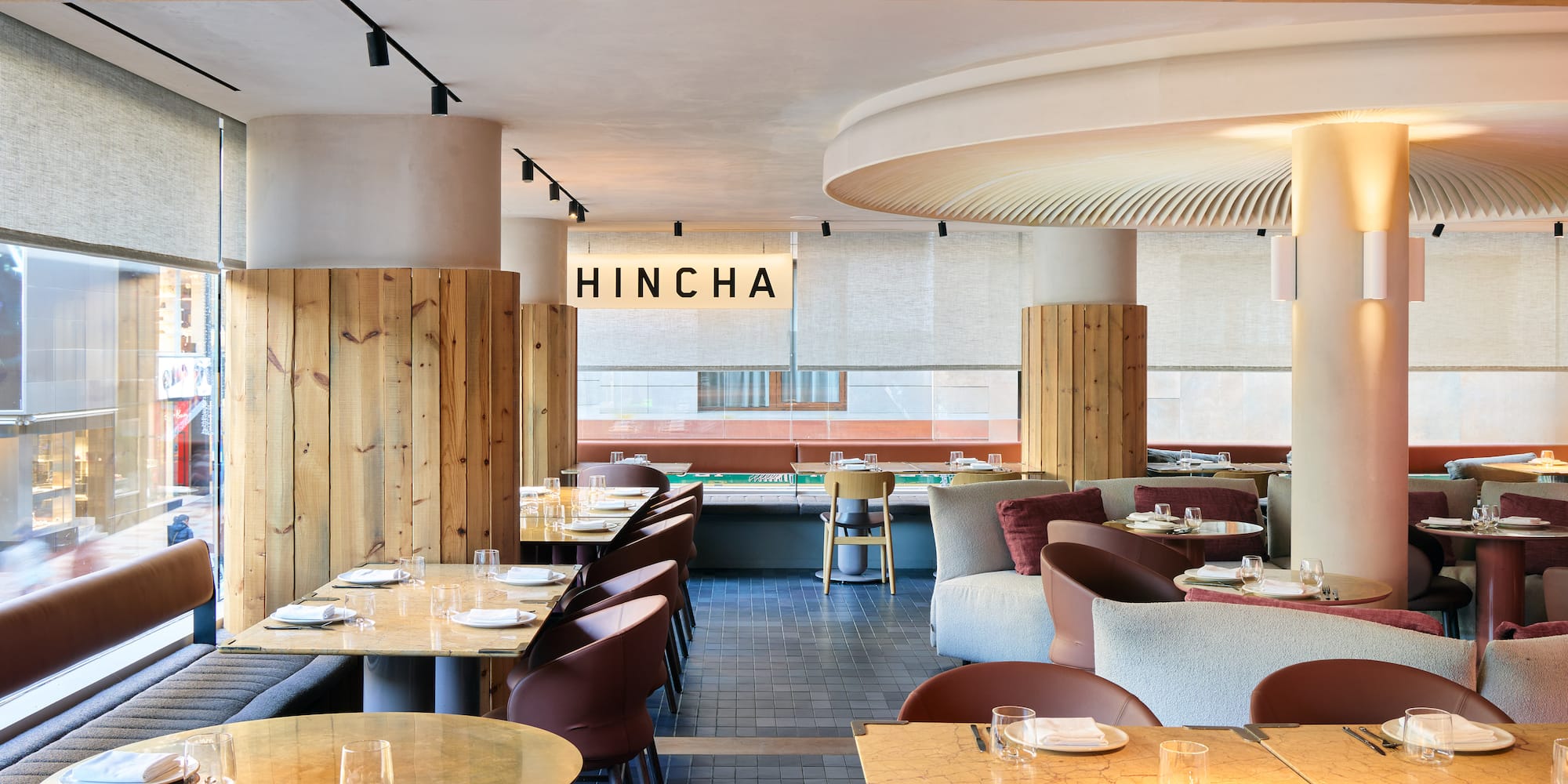 a restaurant with tables and chairs