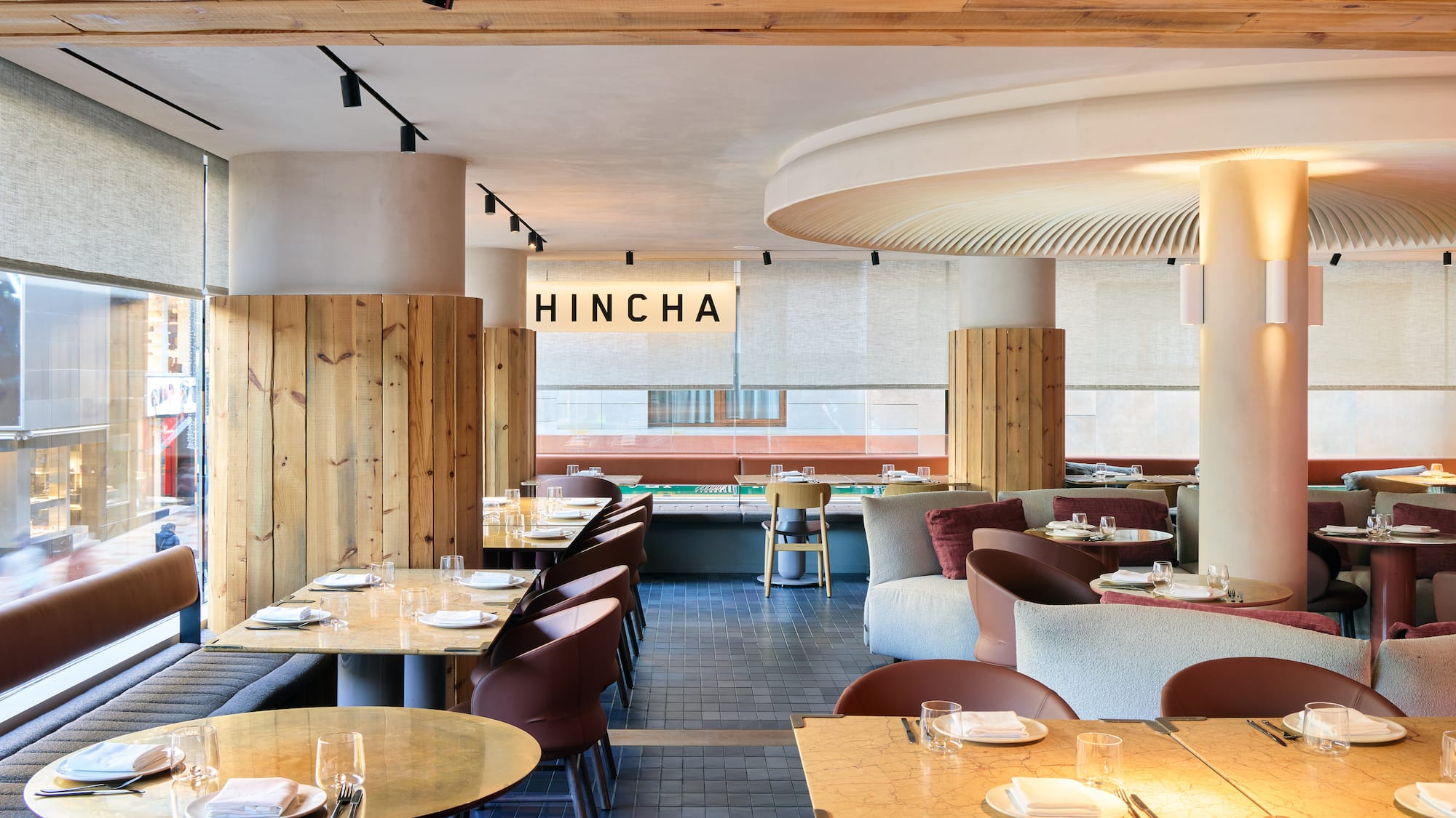 a restaurant with tables and chairs