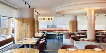 a restaurant with tables and chairs