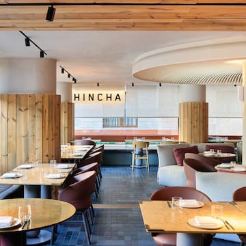 a restaurant with tables and chairs