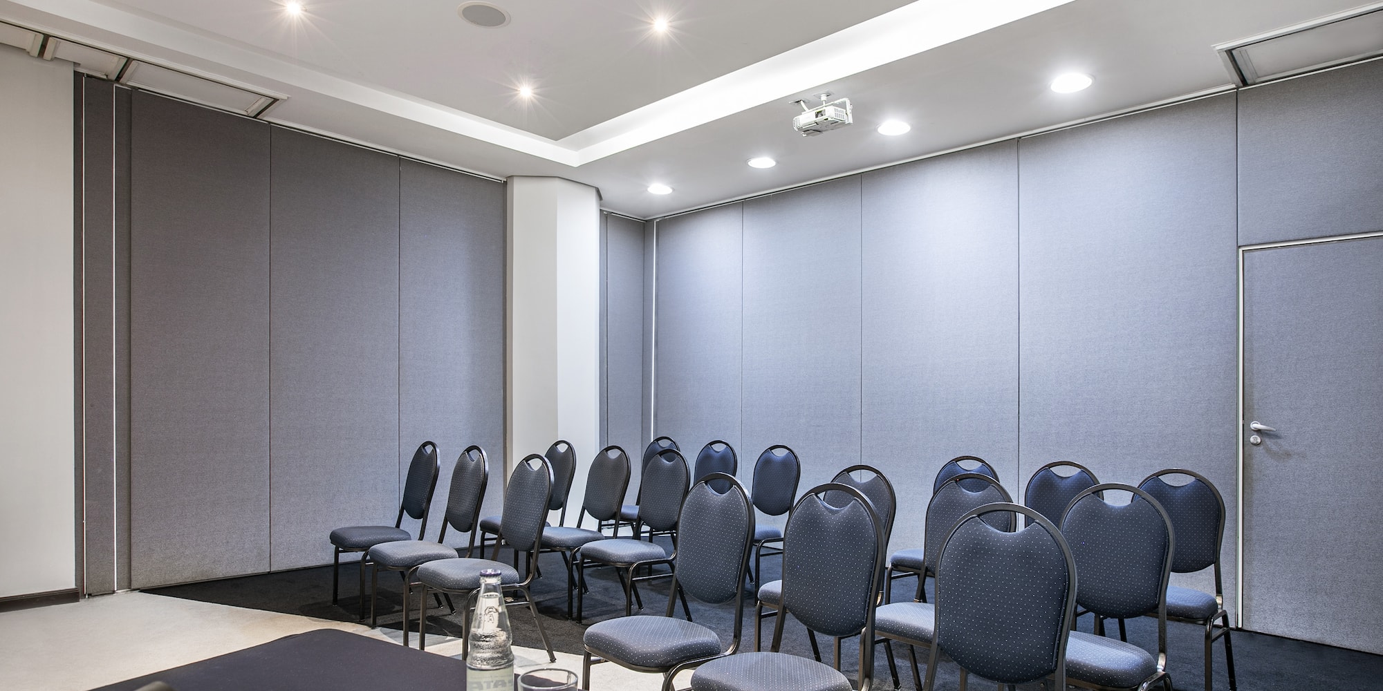 a room with a table and chairs