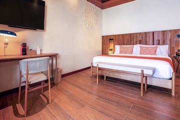 a room with a bed and a table