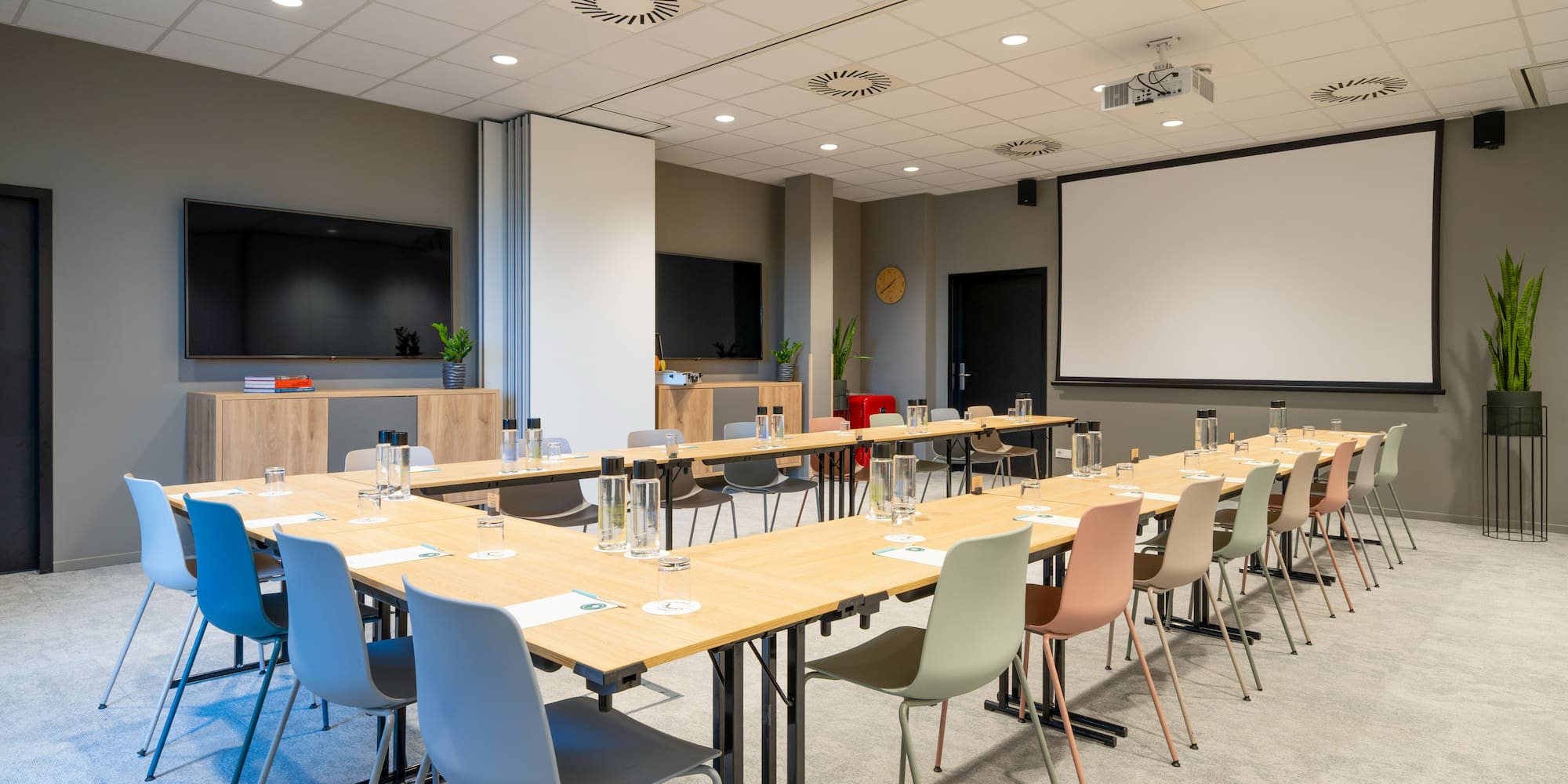 a room with tables and chairs
