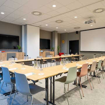 a room with tables and chairs