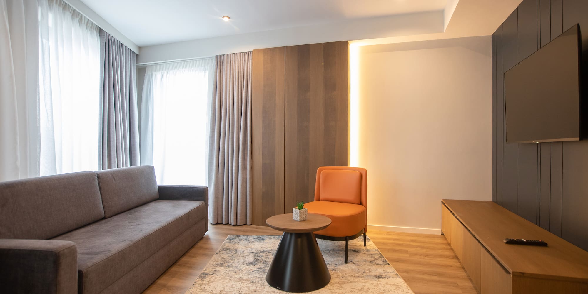 a room with a couch and a table