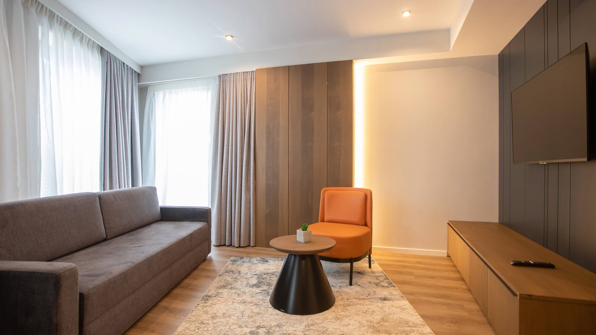 a room with a couch and a table