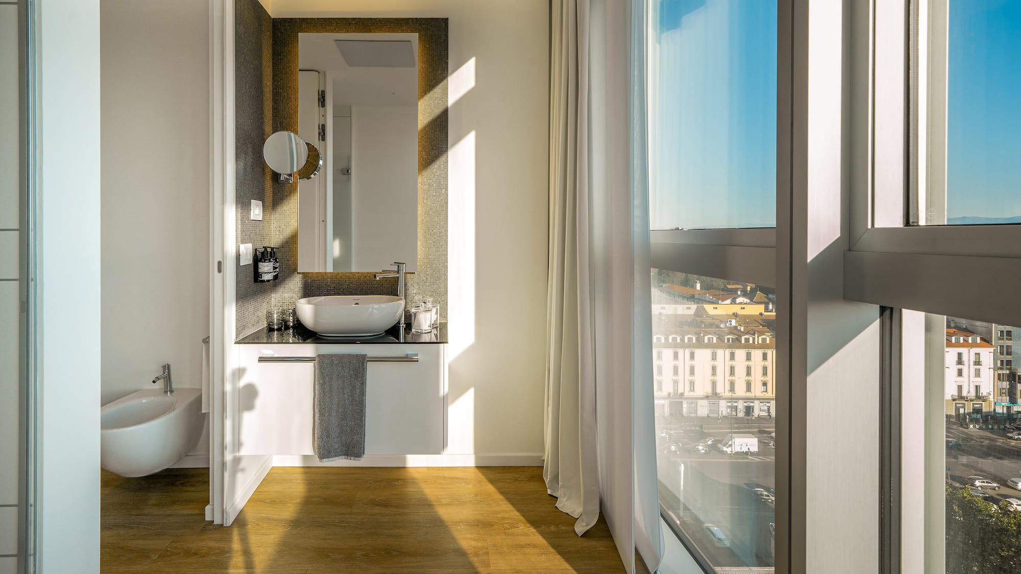 a bathroom with a large window