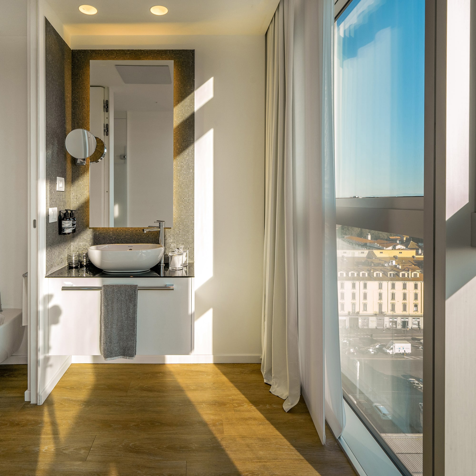 a bathroom with a large window