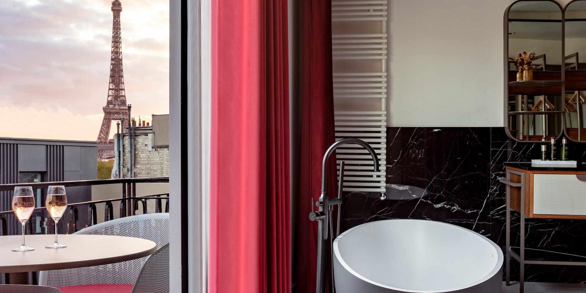 a bathroom with a large window and a large tower