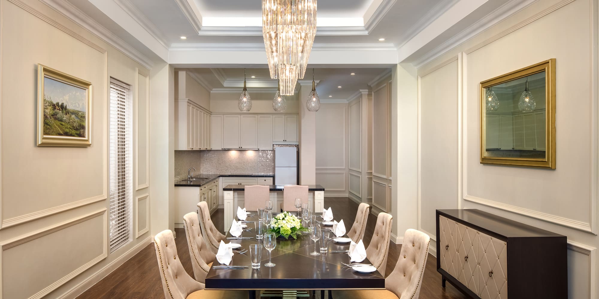 a dining room with a table and chairs