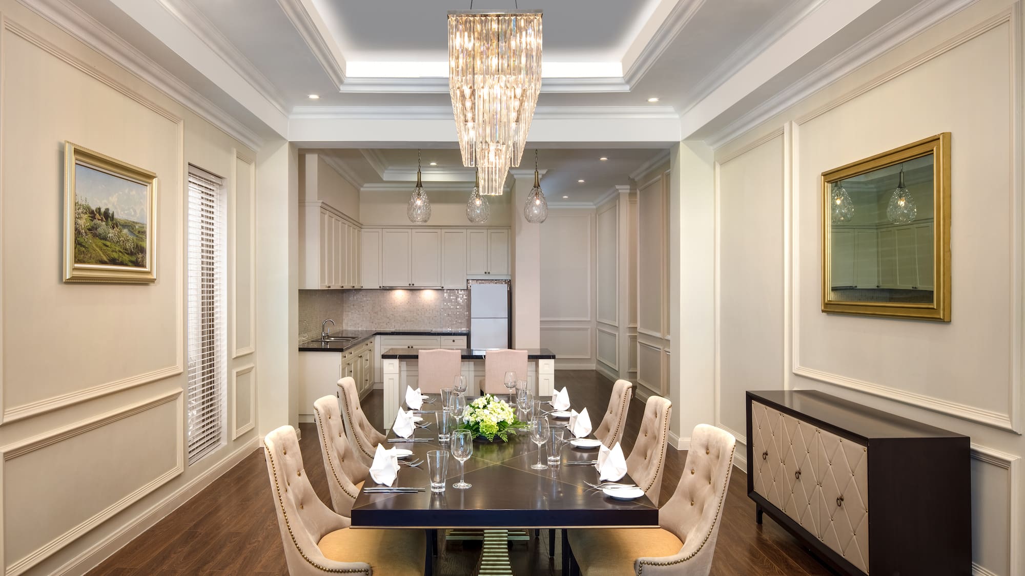 a dining room with a table and chairs