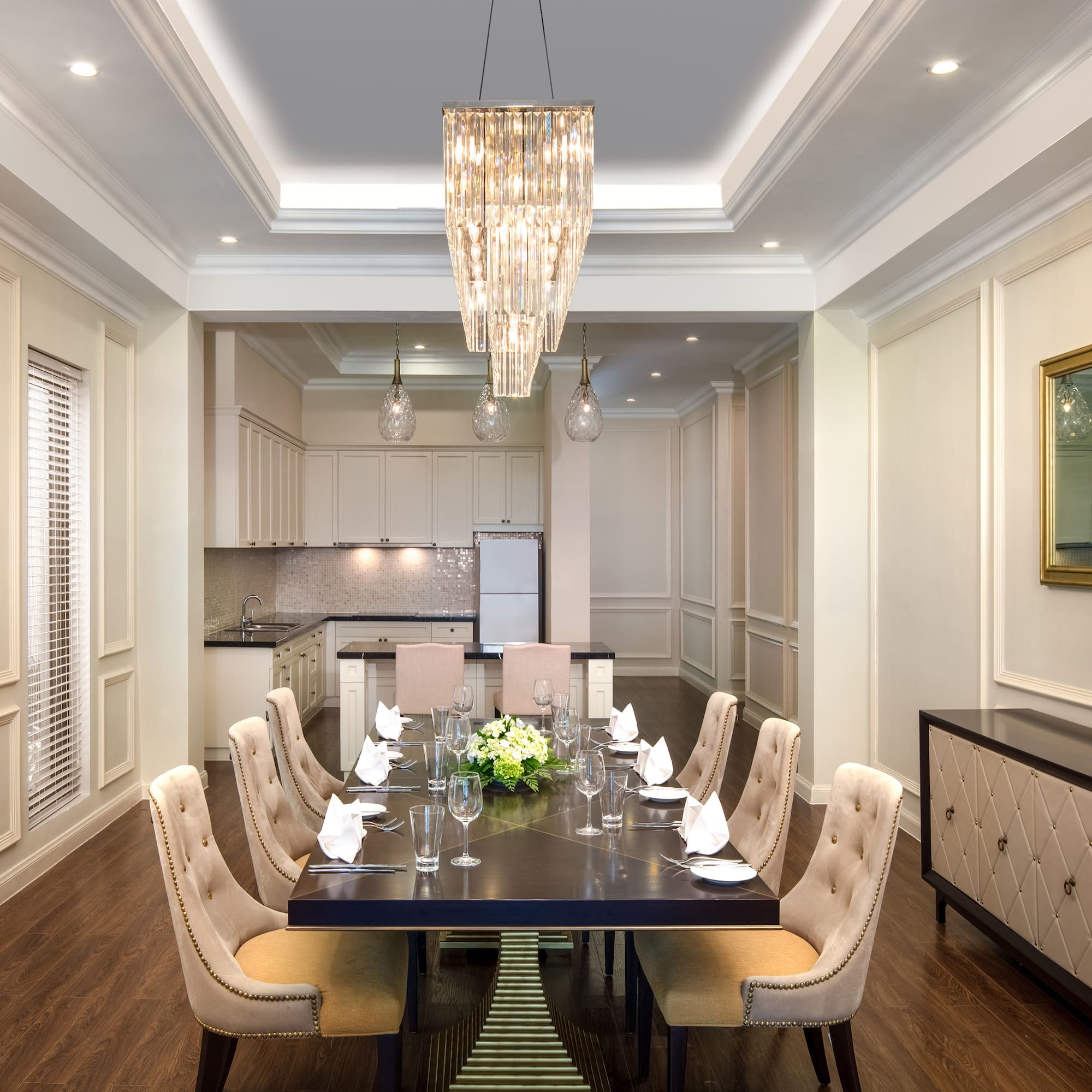 a dining room with a table and chairs