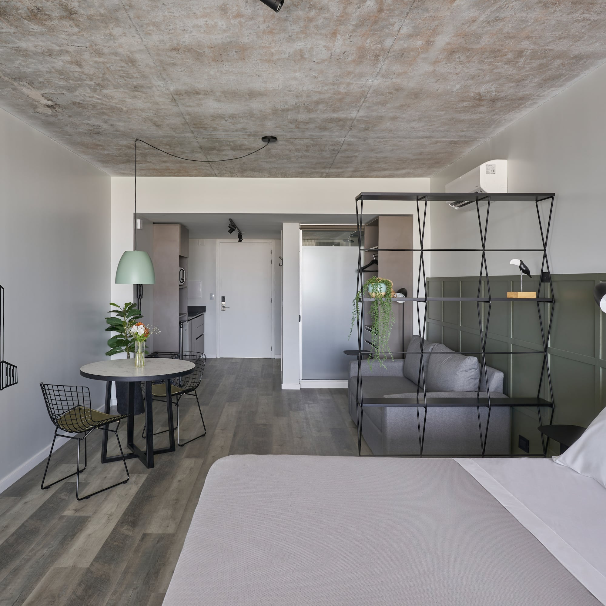 a room with a bed and a table