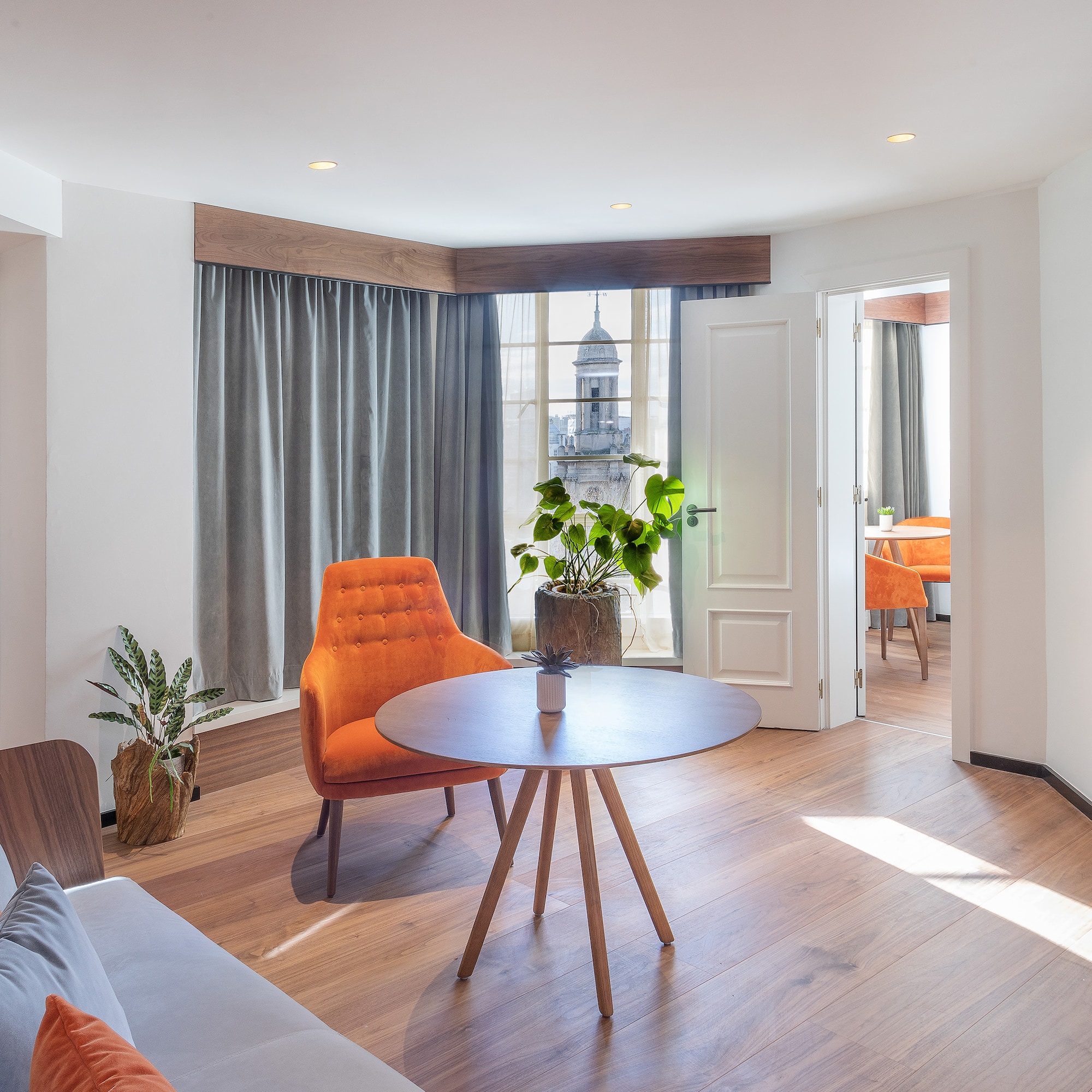 a room with a table and chairs