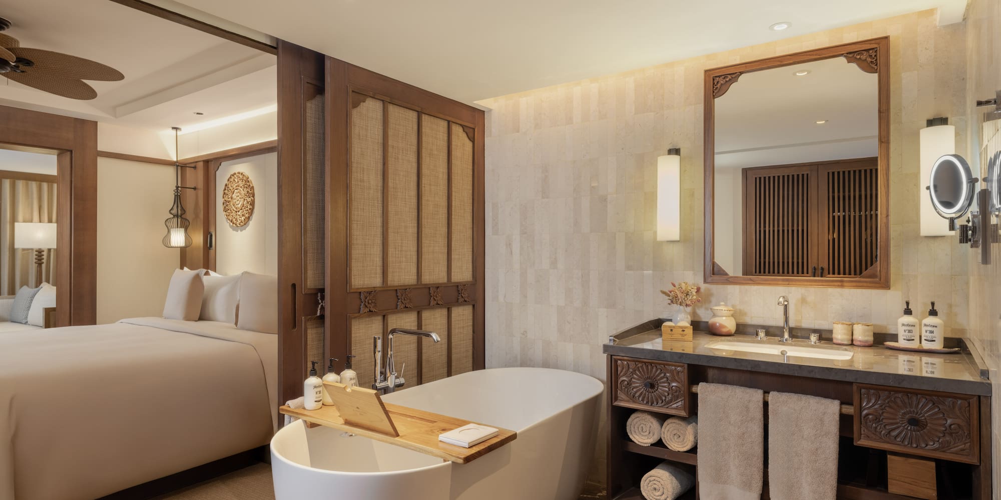 a bathroom with a bathtub and a mirror